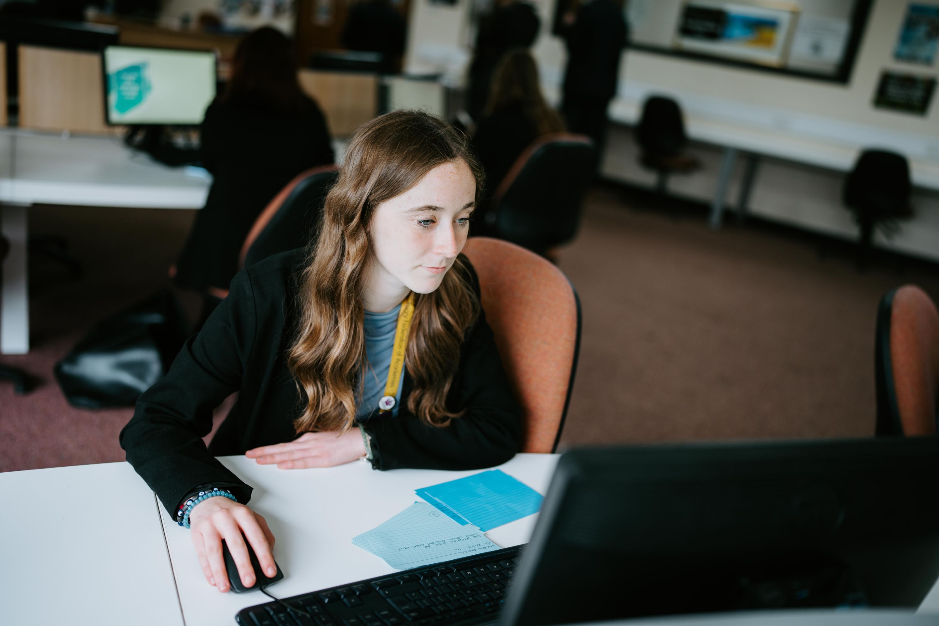 An administrator sat at a computer